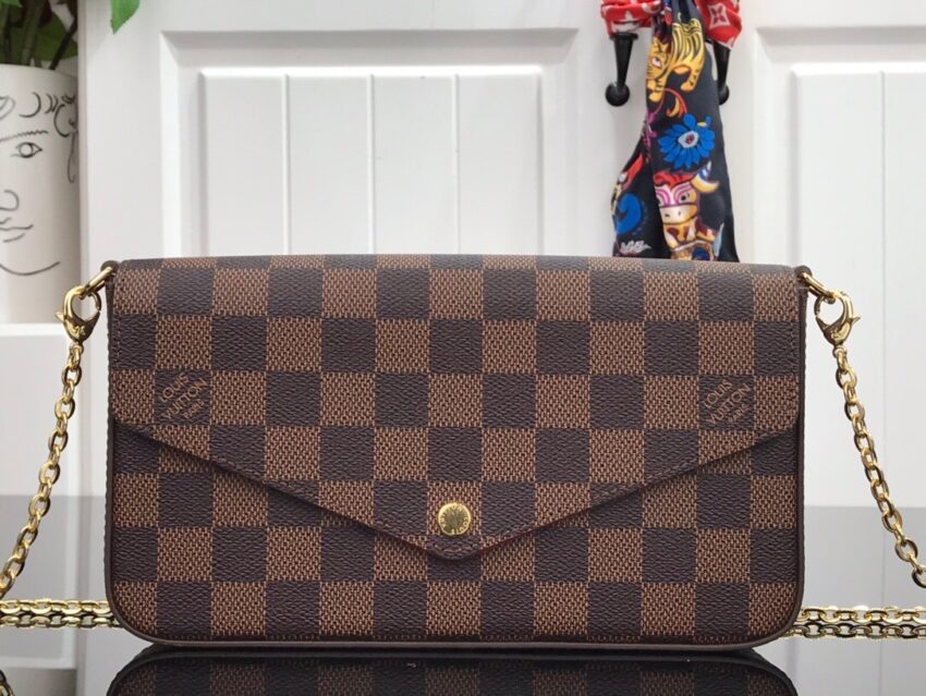 LV pochette brown grid