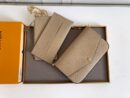 Louis Vuitton pochette crème